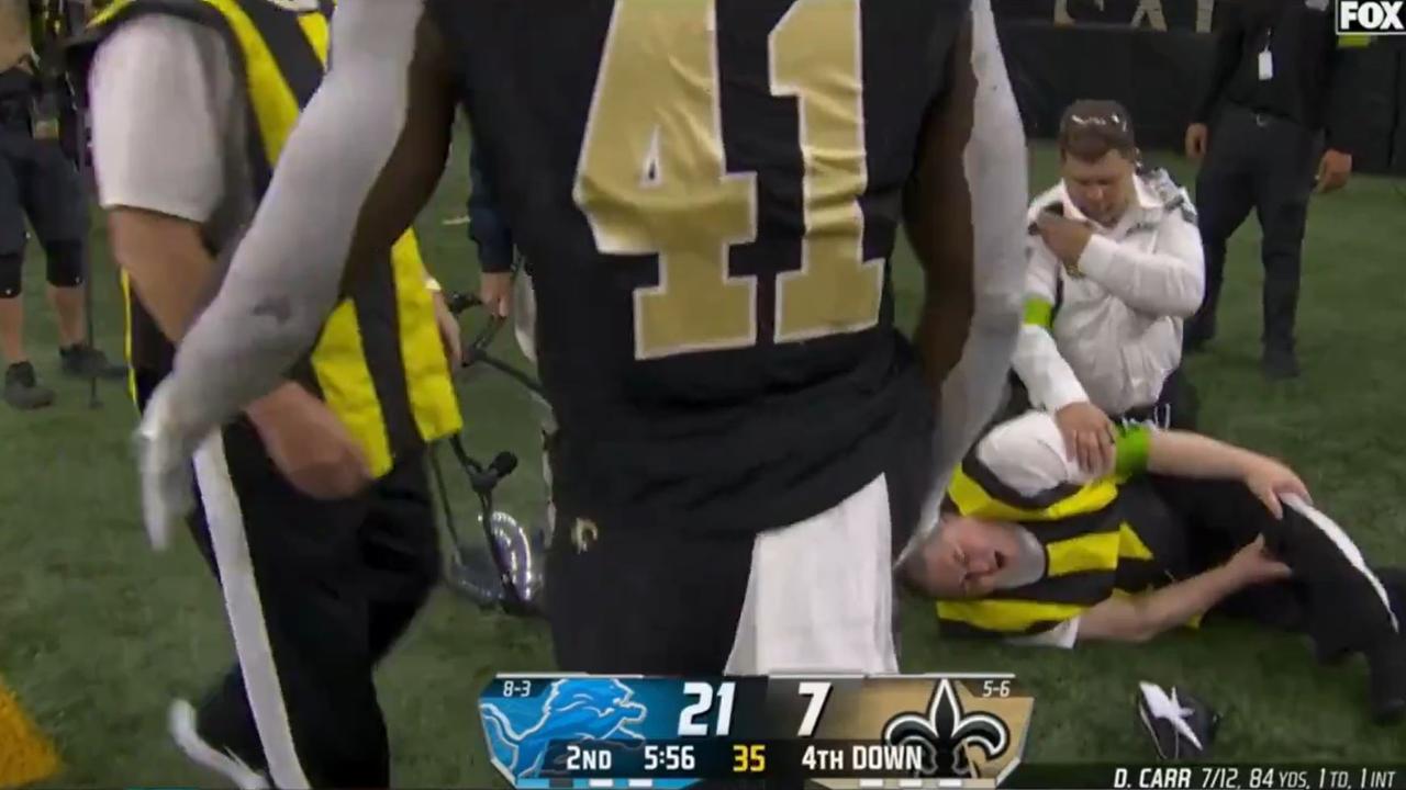 Kamara looks on helplessly as the chain gang members screams out. Pic: Fox NFL