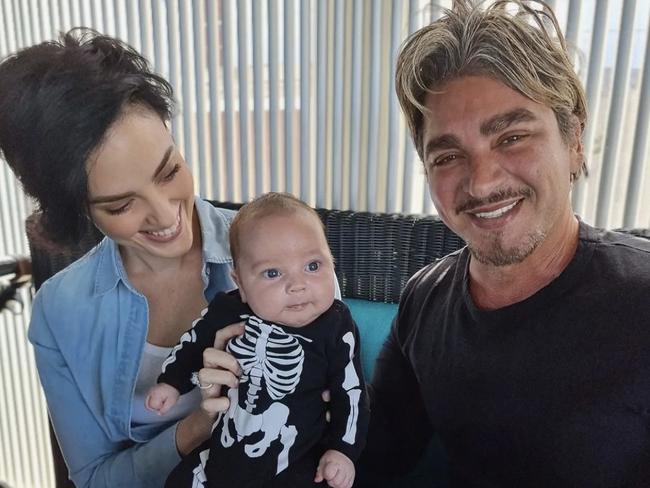 John Ibrahim and Sarah Budge with their son, Elvis.