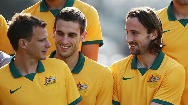 Alex Wilkinson, Matthew Spiranovic and Josh Kennedy line up for the team photo. Picture: Getty