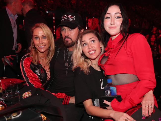 Tish and Billy Ray Cyrus with their daughters, Miley and Noah. Picture: Christopher Polk/Getty Images for iHeartMedia