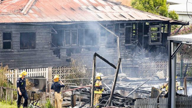 Emergency services at scene of a fire that destroyed three properties overnight. Picture: Richard Walker