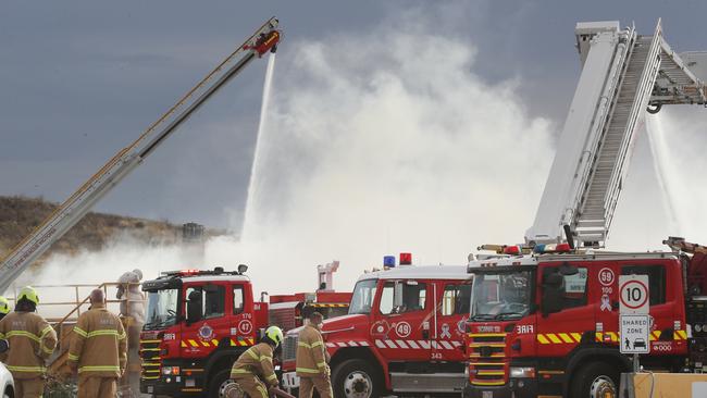 More than 70 firefighters bring the blaze under control. Picture: David Crosling