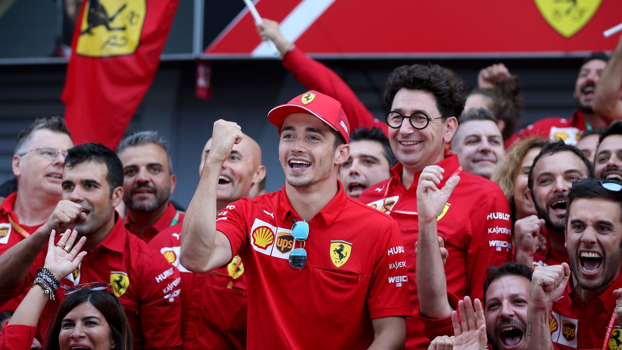 Race winner Charles Leclerc celebrates with his team after the race in Monza.