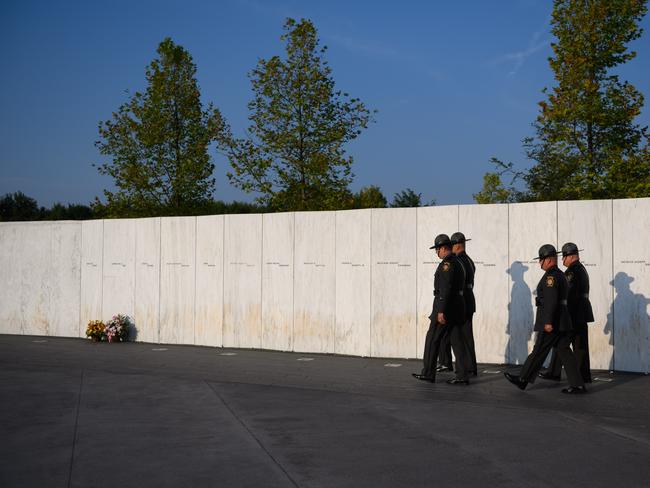 A Pennsylvania State Police Honour Guard along the Wall of Names at the Flight 93 National Memorial in Shanksville, Pennsylvania. Picture: Getty