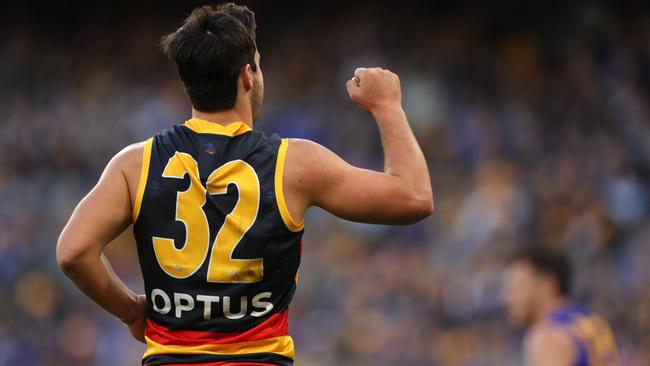 Darcy Fogarty of the Crows celebrates after kicking a goal against the Eagles. Picture: AAP Image/Richard Wainwright