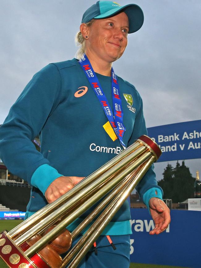 Healy with the Ashes trophy. Picture: Steve Bardens/Getty Images