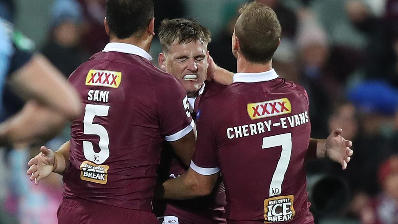 AJ Brimson celebrates a Maroons try.