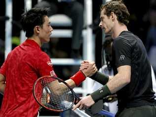 Britain's Andy Murray (right) shakes hands with Kei Nishikori of Japan after winning their ATP World Tour Finals singles tennis match. Picture: Alastair Grant