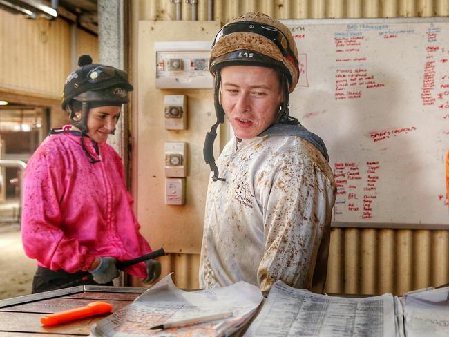 Harry Coffey checks out the jockeys’ trackwork roster at Darren Weir’s Ballarat stables. Picture: Colleen Petch