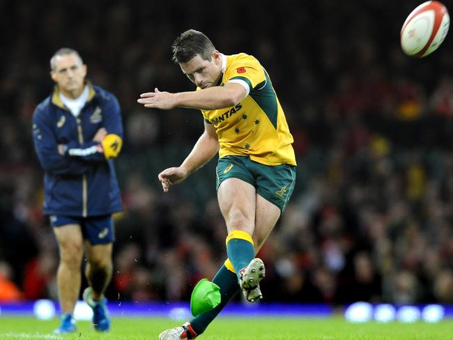 Australia's Bernard Foley kicks a conversion against Wales.