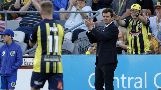 Mariners coach Mike Mulvey applauds the efforts of his players against Melbourne City on Saturday at Gosford Stadium. Picture: AAP