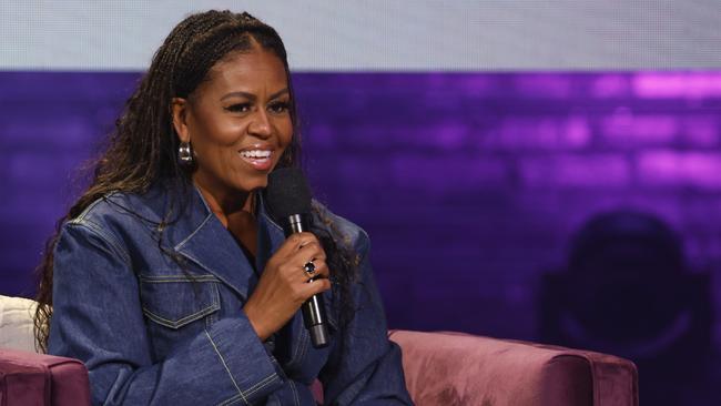 Former first lady Michelle Obama onstage in 2022, talking about her book, The Light We Carry. Picture: Getty Images for Live Nation