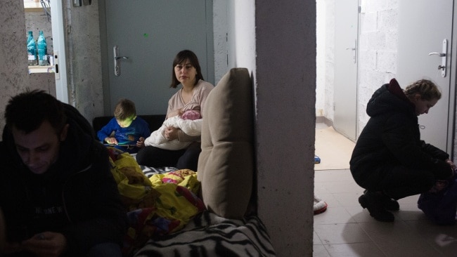 A young family sheltering inside a bomb shelter in Kyiv. Picture: Anastasia Vlasova/Getty Images