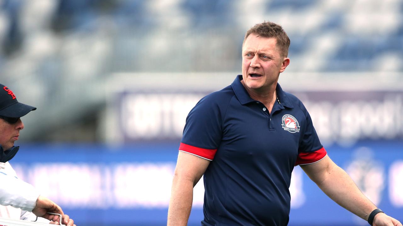 South Barwon coach Mark Neeld leaves the ground at three quarter time in the 2024 GFNL grand final. Picture: Mike Dugdale