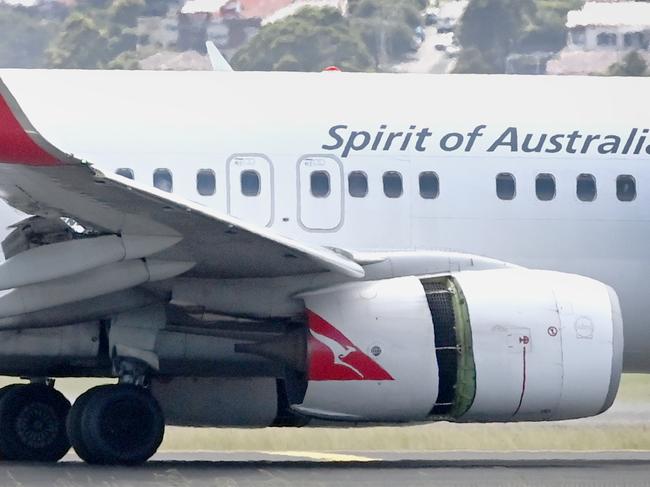 SYDNEY, AUSTRALIA - NewsWire Photos JANUARY 18, 2023: Qantas plane on the tarmac at Sydney International Airport following an emergency mayday alert issued by flight QF144 from Auckland to Sydney. Picture: NCA NewsWire / Jeremy Piper