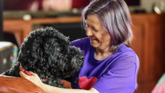 Helen Roberts, End of Life Doula with her dog Mori. Picture: Russell Millard Photography