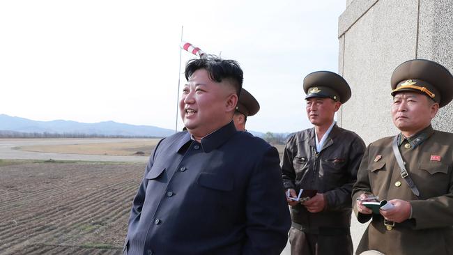 North Koreans are told their leaders are “beloved around the world”. Picture: AFP/KCNA via KNS