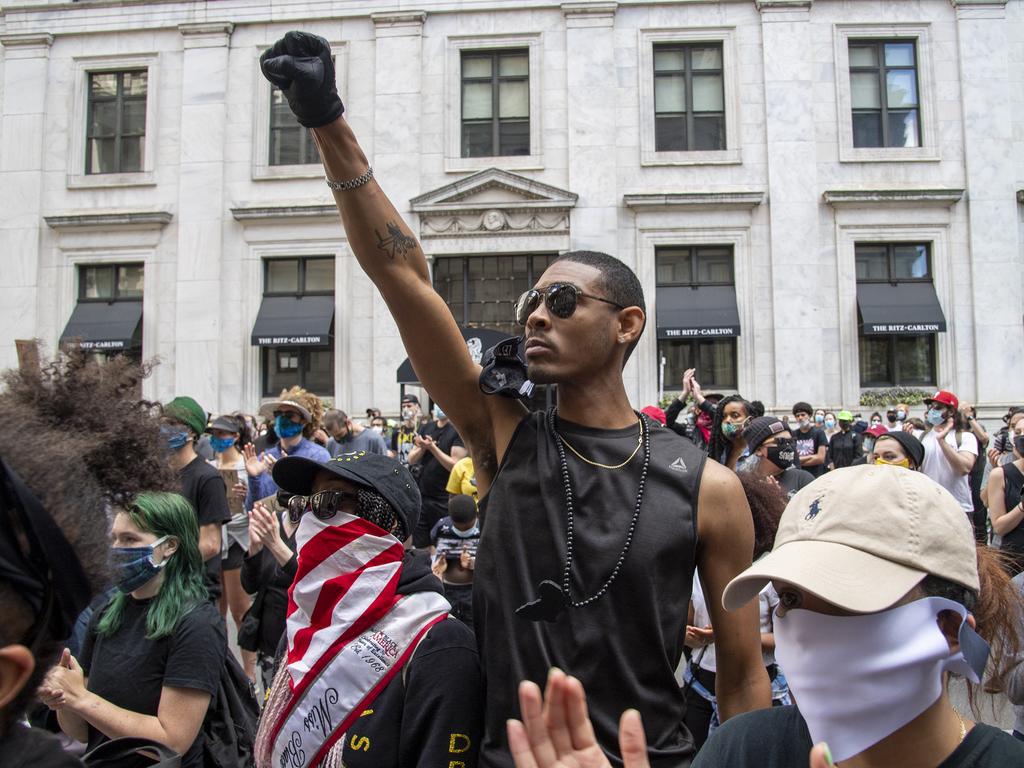 People gather during a Justice for George Floyd rally at the Octavius V. Catto Monument in Philadelphia. Picture: AP