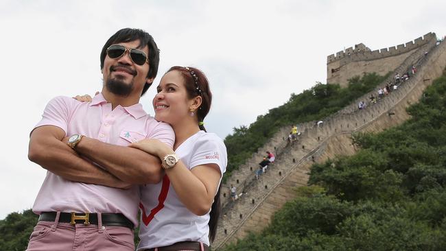 Pacquiao with his wife Jinkee during a visit to China. Picture: Getty Images