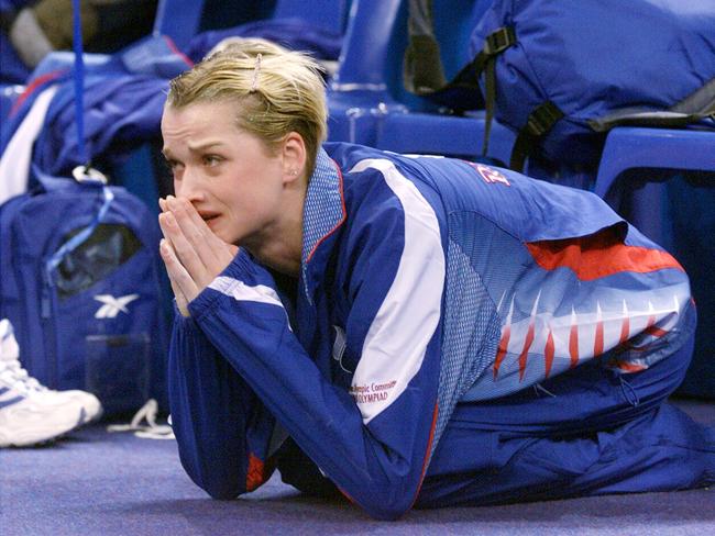 SEPTEMBER 19, 2000 : Svetlana Khorkina of Russia watches sadly from the team bench during the women's gymnastic team finals at the  Sydney Olympic Games 19/09/00.Gymnastics A/CTSydney2000