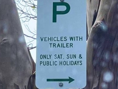 The woman sent a photo to 2GB Radio on Thursday of the parking sign now covered up.