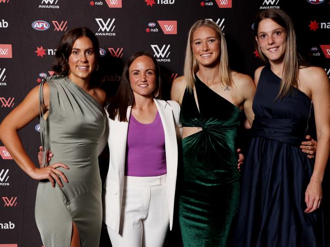 MELBOURNE, AUSTRALIA - APRIL 05: (From L to R) Melbourne's AFLW All-Australian players Libby Birch, Daisy Pearce, Tayla Harris and Lauren Pearce pose for a photo during the 2022 AFLW W Awards at Marvel Stadium on April 05, 2022 in Melbourne, Australia. (Photo by Jonathan DiMaggio/AFL Photos/Getty Images)