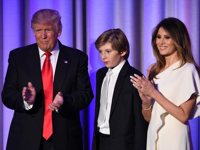 US President-elect Donald Trump arrives with his son Baron and wife Melania at the New York Hilton. Picture: Saul Loeb/AFP