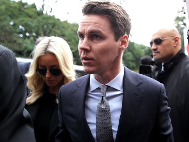 Oliver Curtis and wife Roxy Jacenko arriving at court for sentencing today. Picture: Ross Schultz