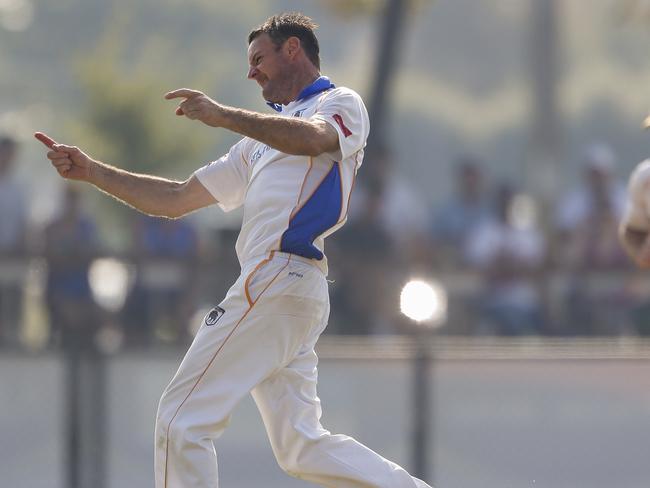 East Sandringham’s Luke Dallas celebrates a wicket in the grand final.