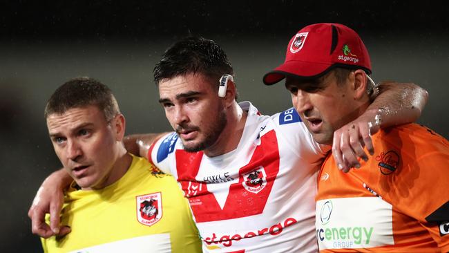 SYDNEY, AUSTRALIA - JULY 22: Cody Ramsey of the Dragons is assisted from the field after injuring his knee during the round 19 NRL match between the St George Illawarra Dragons and the Manly Warringah Sea Eagles at Netstrata Jubilee Stadium, on July 22, 2022, in Sydney, Australia. (Photo by Jason McCawley/Getty Images)