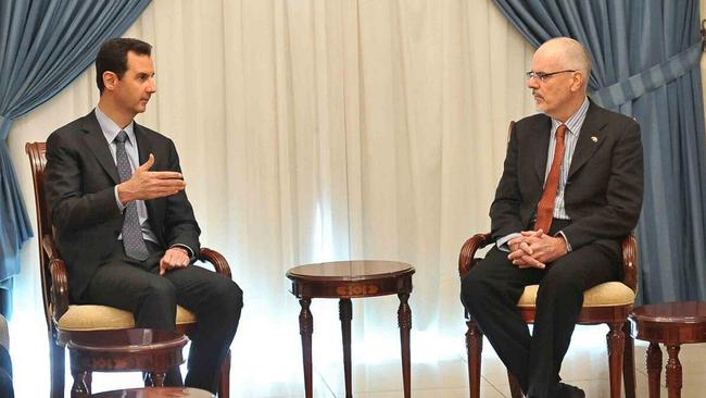 Syrian President Bashar al-Assad, left, meets with Tim Anderson in Damascus in 2013. Picture: Twitter