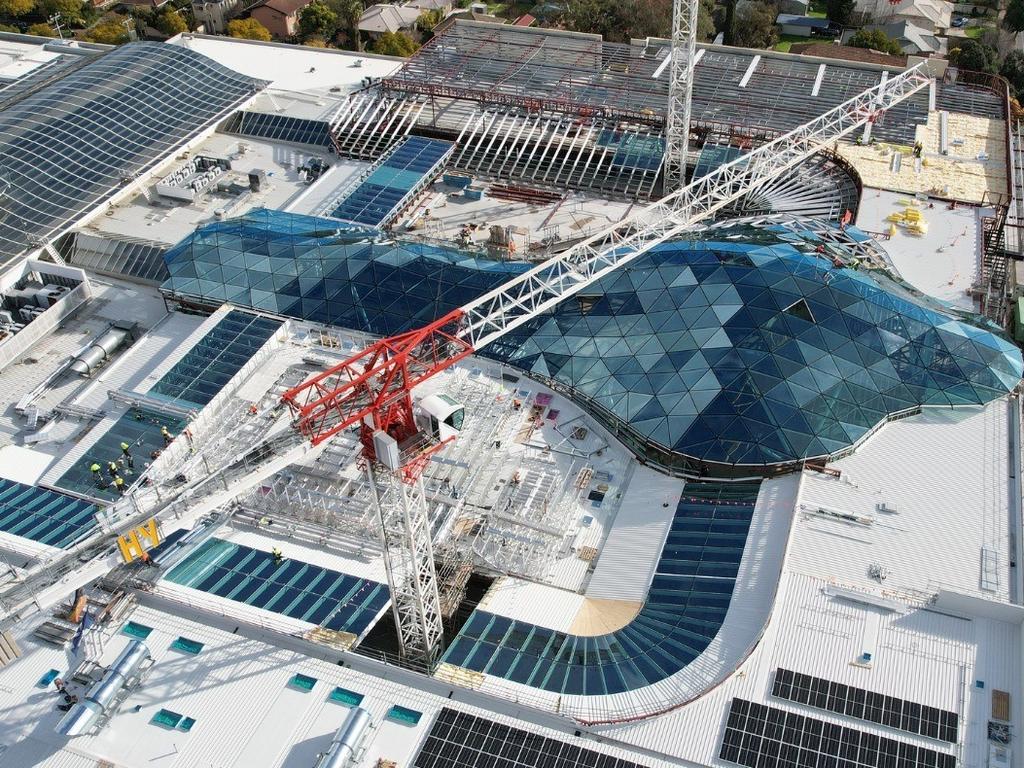 Burnside Village Stage 6 construction. The final installation of the 609 glass panels of the Lanik roof was completed last Saturday. Picture: Hansen Yuncken