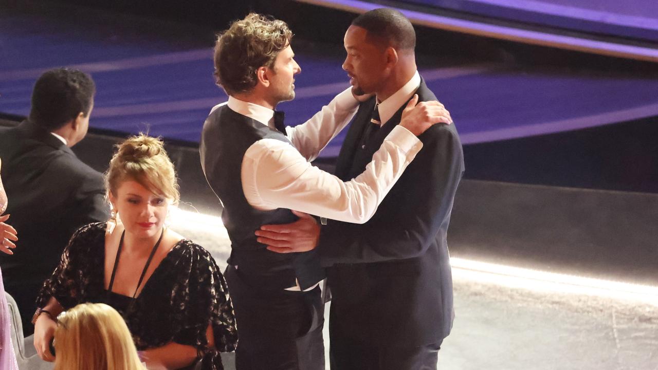 Bradley Cooper comforted Will Smith in the aftermath of the slap. (Myung Chun / Los Angeles Times via Getty Images)