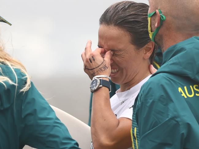 ICHINOMIYA, JAPAN - JULY 27: Sally Fitzgibbons of Team Australia shows disappointment after losing her women's Quarter Final on day four of the Tokyo 2020 Olympic Games at Tsurigasaki Surfing Beach on July 27, 2021 in Ichinomiya, Chiba, Japan. (Photo by Ryan Pierse/Getty Images)