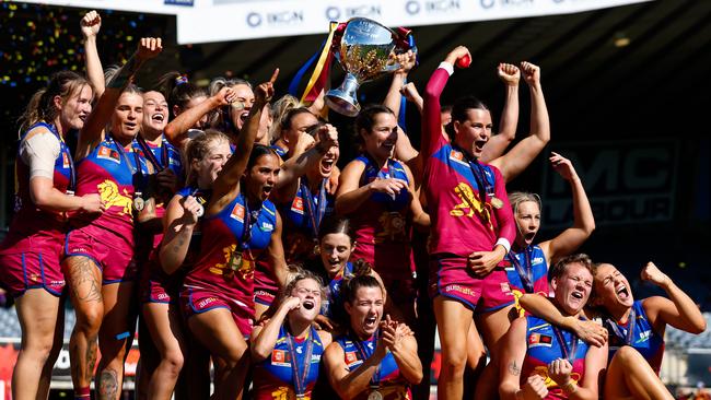 The Lions celebrate after the 2023 AFLW Grand Final. Photo by Dylan Burns/AFL Photos via Getty Images.