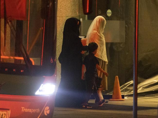 Two women and a child from Afghanistan arrive into Perth from Kabul. Picture: Getty Images