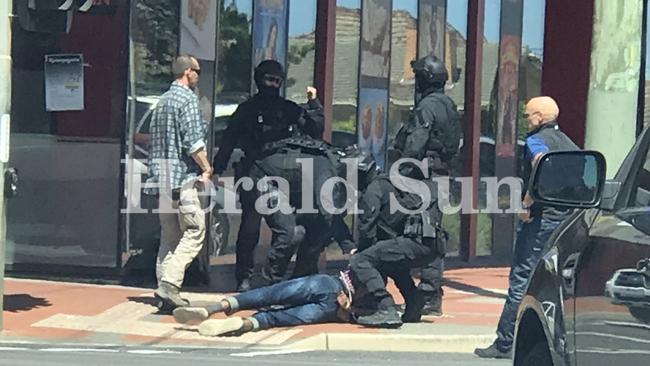 The arrest on the corner of Synnot and Bridge st Werribee. Picture: Jessica Karasmani.