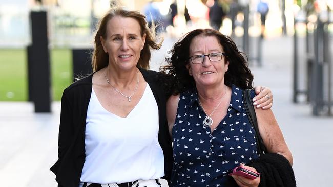 Pauline Sidon and Pamela McLaren, sisters of manslaughter victim Linda Sidon, leave the supreme Court in Brisbane. (AAP Image/Dan Peled) NO ARCHIVING