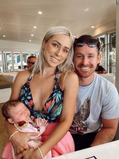 Michael Morgan (right) with his wife Brianna and baby daughter Penelope. Photo: Instagram