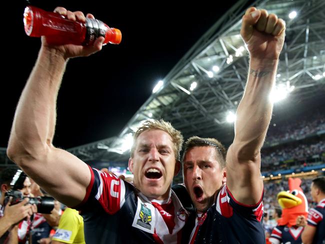 Mitchell Aubusson and Mitchell Pearce celebrate winning the 2013 NRL grand final. Picture Gregg Porteous