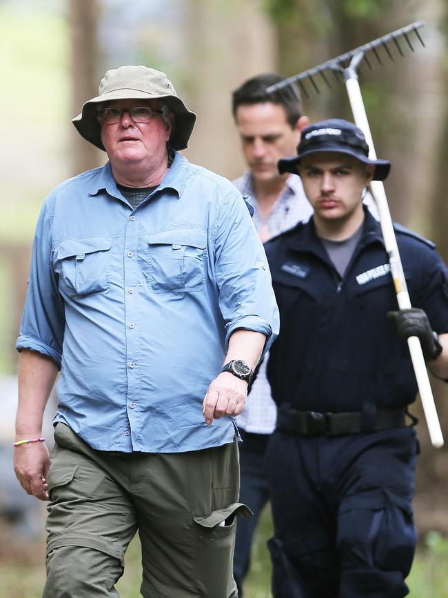 Hydrologist Dr Jon Olley goes to check a place of interest near a creek bed. Picture: Peter Lorimer