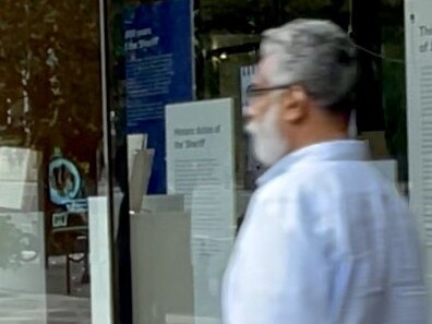 Dhammika Hikkaduwa leaving Downing Centre Local Court.
