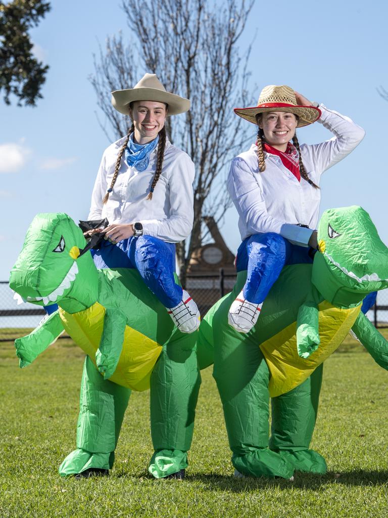 Year 12 Toowoomba Anglican School students Mognild Eerkens (left) and Stephanie Martin celebrating Bookweek. Picture: Nev Madsen.