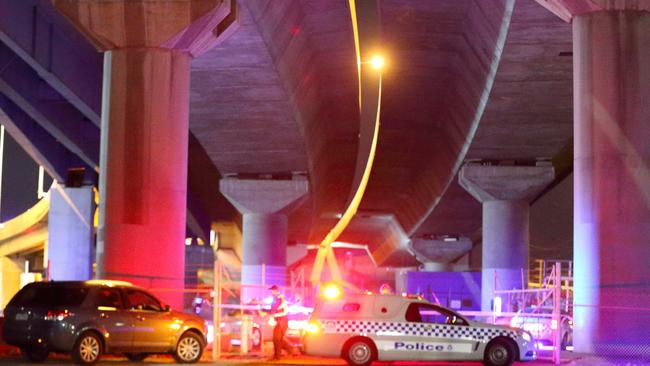 The motorcyclist went over the barrier and was found in this Turner St yard. Picture: Patrick Herve