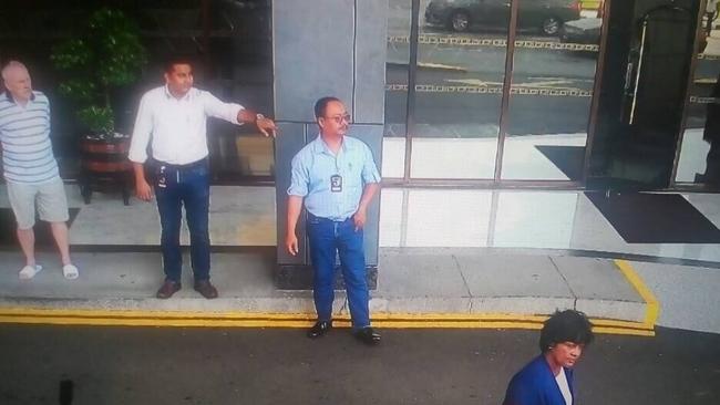 The last known photo from CCTV of Australian citizen Annapuranee Jenkins as she leaves her hotel in Penang, Malaysia, heading off to a dental appointment on Dec. 13, 2017, about 2.45pm. She hasn't been seen since. Her husband Frank Jenkins (far left) watches on.