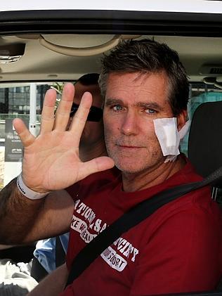 Gary Hamrey leaving the Gold Coast University Hospital in the company of family and his partner.