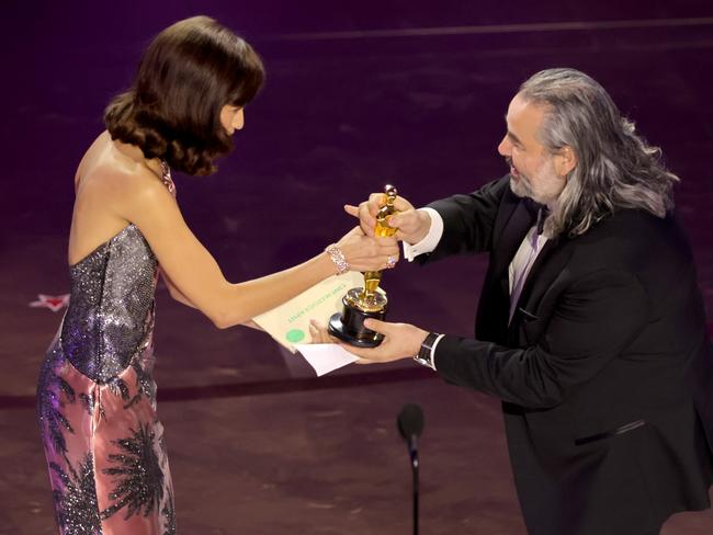 Zendaya presents the Best Cinematography award for "Oppenheimer" to Hoyte van Hoytema onstage. Picture: Getty Images