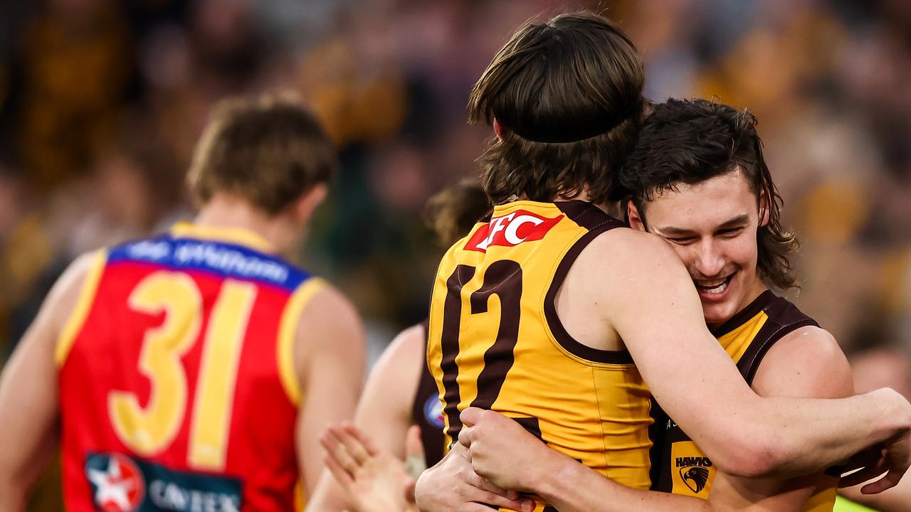 MELBOURNE, AUSTRALIA - JUNE 10: Connor Macdonald of the Hawks celebrates a goal with teammate Will Day during the 2023 AFL Round 13 match between the Hawthorn Hawks and the Brisbane Lions at the Melbourne Cricket Ground on June 10, 2023 in Melbourne, Australia. (Photo by Dylan Burns/AFL Photos via Getty Images)