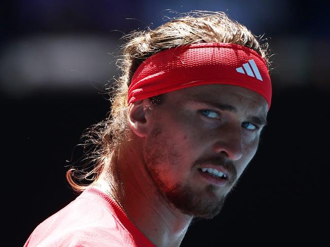 MELBOURNE, AUSTRALIA - JANUARY 24: Alexander Zverev of Germany reacts in the Men's Singles Semifinal against Novak Djokovic of Serbia during day 13 of the 2025 Australian Open at Melbourne Park on January 24, 2025 in Melbourne, Australia. (Photo by Graham Denholm/Getty Images)