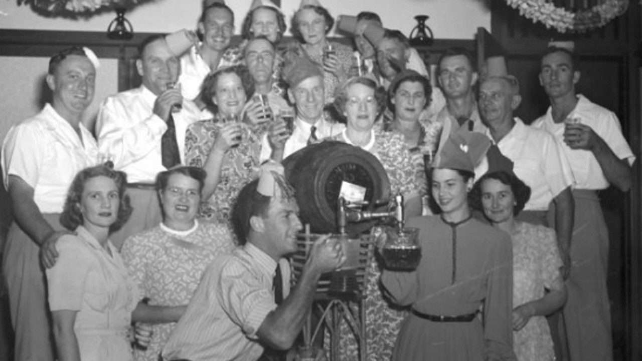 New Year‘s party with Mrs R. W. Thomas and other revellers, Brisbane, 1950. Photo: State Library of Queensland